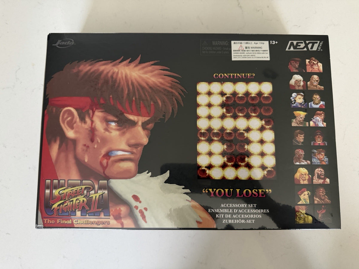 ⭐ Jada Toys Ultra Street Fighter 2 - "You Lose" Accessory Set1